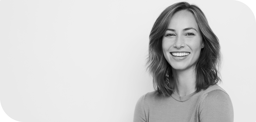 Black and white portrait of a smiling woman
