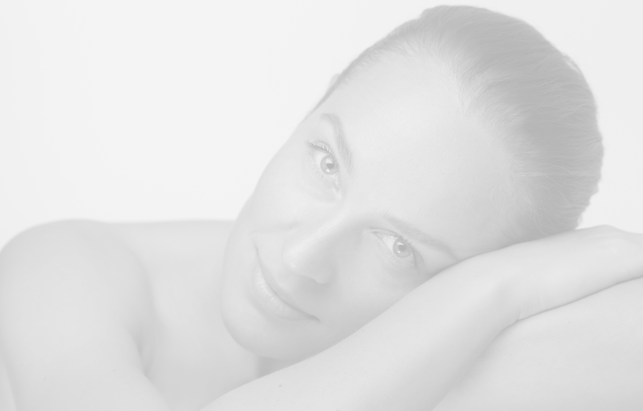 Faded back black and white portrait of a woman